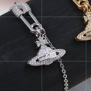 Vivienne Westwood Silver chain safety pin bracelet price is firm